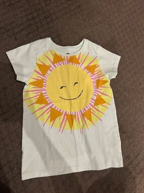Tea light blue shirt with Yellow Smiling Sun and Pink Rays
